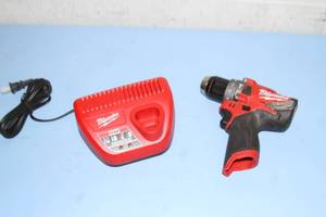 lot 16 image: Milwaukee Tool M12 FUEL 12 Hammer Drill with PowerState Brushless Motor and Battery Charger