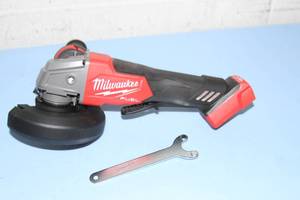 lot 30 image: Milwaukee Tool M18 FUEL 4.5  5 Braking Grinder Paddle Switch No Lock - Model 2880-20 - New
