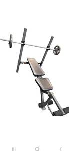 lot 28 image: Fitness Gear Bench Press, bar and Two-25LB One Inch Weight Plates
