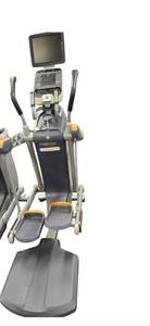 lot 46 image: Precor AMT 100i Elliptical with a built in TV