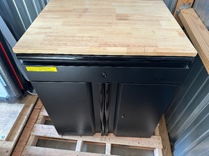 lot 5 image: Like New Husky Heavy Duty Welded 20-Gauge Steel 1-Drawer 2-Door Garage Base Cabinet in Black 28 in. W x 32 in. H x 21.5 in. D Retail $549.99