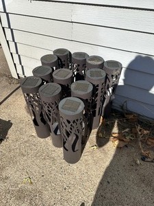 lot 25 image: Qty 9 Tommy Bahama Solar Bollard Lights
