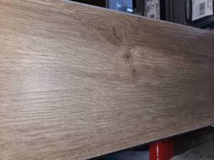 lot 12 image: 4 boxes 12 mil Sandino vinyl plank flooring