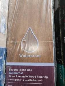 lot 25 image: 4 boxes skaggs island oak laminate plank flooring