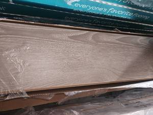 lot 30 image: 4 boxes Cradle rock waterproof laminate flooring