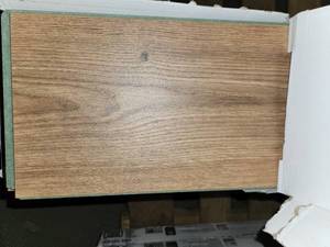 lot 56 image: 5 boxes Lifeproof venture canyon hybrid resilient flooring