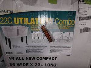 lot 65 image: 36x23 double laundry sink with faucet