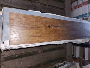 lot 67 image: 7 boxes hickory gripstrip vinyl plank flooring