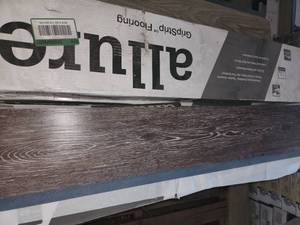 lot 69 image: 7 boxes brushed oak taupe gripstrip vinyl flooring