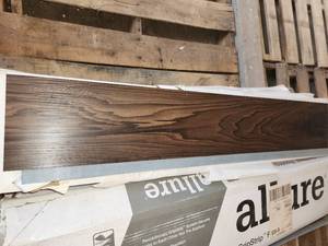 lot 70 image: 6 boxes Davis mountain oak gripstrip vinyl flooring