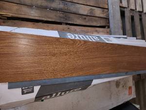 lot 71 image: 6 boxes autumn oak gripstrip vinyl flooring