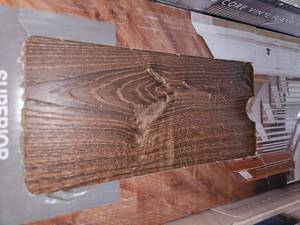 lot 104 image: 3 boxes lifeproof burnt oak vinyl flooring