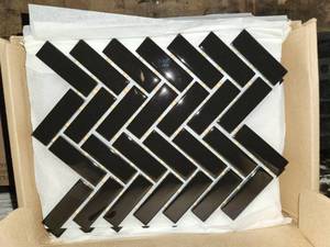 lot 139 image: 4 boxes daltile black herringbone mosiac tile