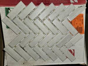 lot 140 image: 2 boxes parchment herringbone mosiac tile