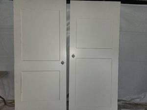 lot 143 image: 2-3684 solid core white 2 panel doors
