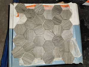 lot 179 image: Lifeproof Shadow wood hexagon mosiac tile