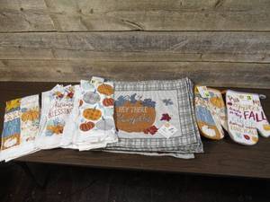 lot 253 image: Mixed Lot 14 Tapestry Place Mats, 5 Kitchen Towel Sets, and 2 Oven Mitts-Fall Harvest Themed