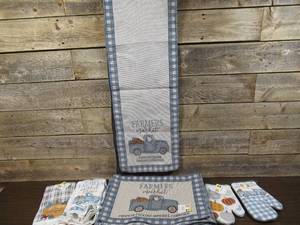 lot 254 image: Mixed Lot 11 Tapestry Place Mats,1 Table Runner, 4 Kitchen Towel Sets, and 2 Oven Mitts-Fall Harvest Themed