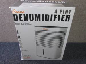 lot 30 image: Crane 4 Pint Compact Dehumidifier w...