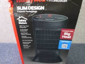 lot 50 image: Honeywell Slim Design Heater...