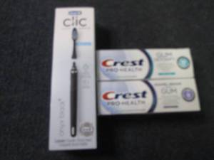 lot 138 image: Oral B Clic Toothbrush, 2 tubes Cre...