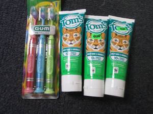 lot 139 image: 3 Kid Toothbrushes & Toms Toothpas...