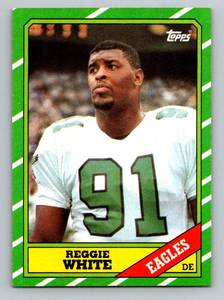 lot 120 image: Reggie White RC 1986 Topps #275 Rookie Vintage Football Card
