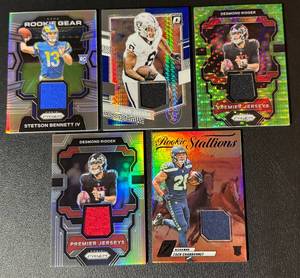 lot 85A image: 5 Relic Lot - Josh Jacobs, (2) Desmond Ridder, Zach Charbonnet, Stetson Bennett Football Cards