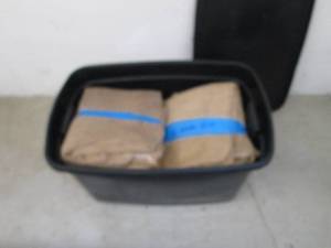 lot 161 image: Coverd tote full of gunny sacks...