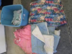 lot 179 image: (2) Storage totes of assorted quilt...