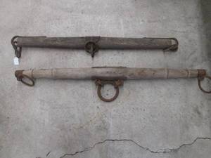 lot 190 image: (2) Primitive barnwood ox yokes wit...