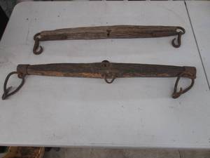 lot 192 image: (2) Primitive barnwood ox yokes wit...