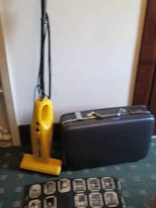 lot 212 image: Eureka The Boss Bayless stick vacuu...
