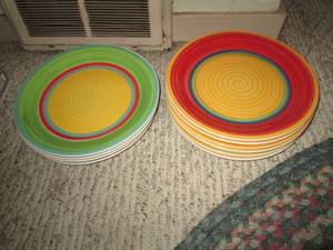 lot 261 image: Stack of bright and festive ceramic...