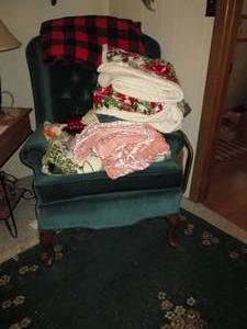 lot 277 image: Chair heaped with a heated blanket ...