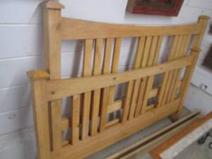 lot 103 image: King size Light tone hardwood headb...