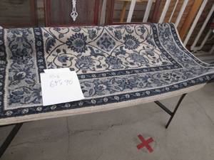 lot 69 image: Blue and Creme Floral area rug appr...