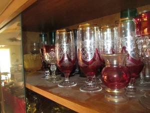 lot 12 image: Shelf filled with decorative glassw...
