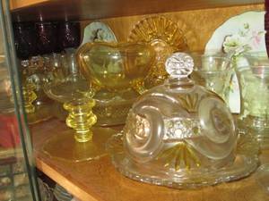 lot 13 image: Shelf filled with decorative glassw...