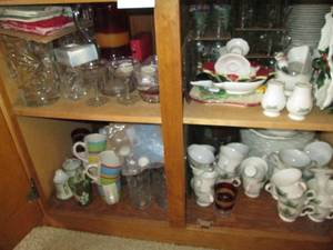 lot 16 image: Cupboard filled with china and deco...