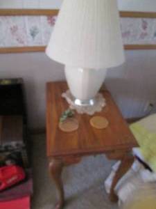 lot 32 image: End table with sliding tray and a l...