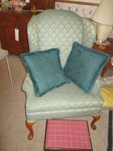 lot 307 image: Living room chair with wood legs...