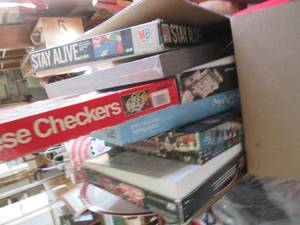 lot 281 image: Box of games and home decor...