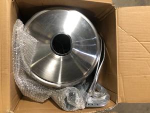 lot 11 image: Hampton Bay 48000 BTU Stainless Steel Propane Standing Patio Heater with Wheels Damaged  Customer Returns See Pictures