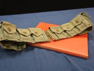 AMMO BELT AND BOOK