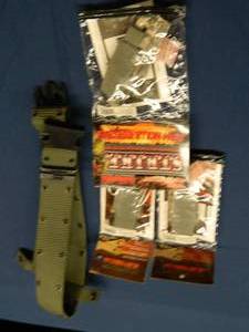 LOT OF NEW STRIKE SINGLE PISTOL MAG CLIPS AND BELT
