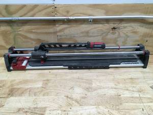 lot 31 image: Husky 28 Professional Tile Cutter Model # JHD700