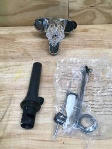 lot 72 image: Project Source Bathroom Faucet Model # 65456W-6001