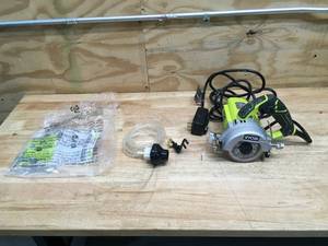 lot 144 image: Ryobi 4 Hand Held Tile Saw Model # TC4011