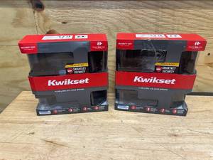 lot 147 image: KWIKSET Lot of 2- Halifax Matte Black Entry Door Lever with Single Cylinder Deadbolt Combo Packs featuring SmartKey Security